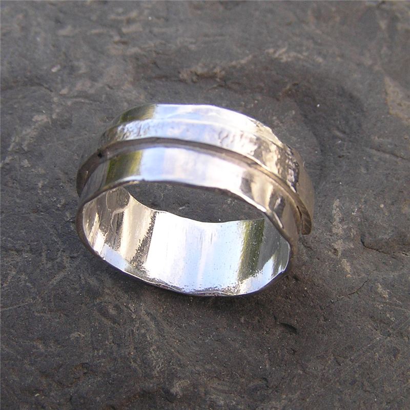 Silver ring with textured band 