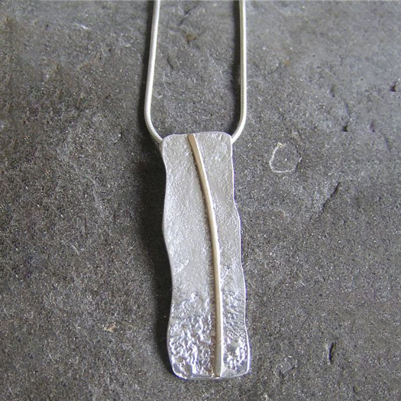 Rockpool Collection -Silver and gold wave pendant 